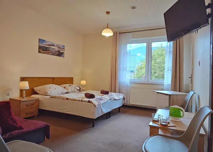 Strzelec Couette-café 3*